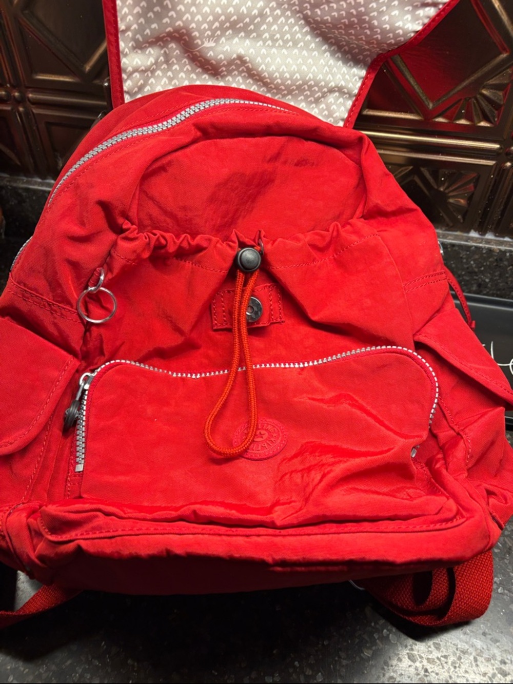 Kipling Red Canvas Drawstring Backpack